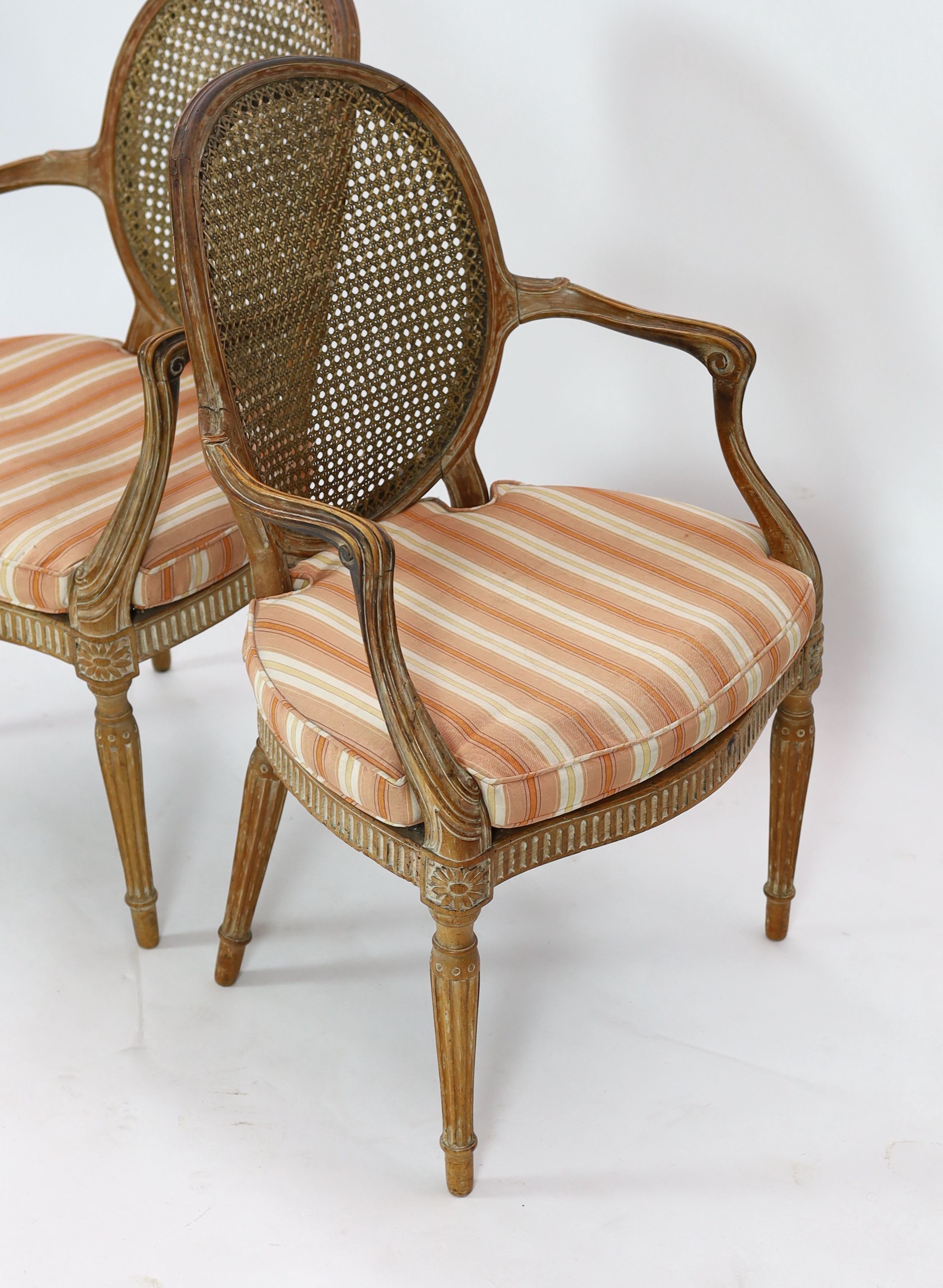 A set of four late 18th century French carved beech fauteuils, W.54cm D.53cm H.91cm